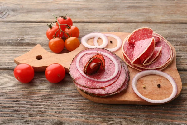 Sliced salami with spices — Stock Photo, Image