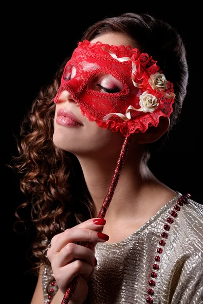 Beautiful girl with masquerade mask on dark background — Stock Photo, Image