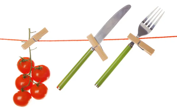 Tenedor, cuchillo y tomates rojos maduros — Foto de Stock