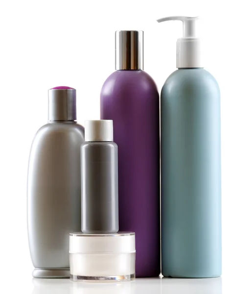 Diferentes botellas cosméticas — Foto de Stock