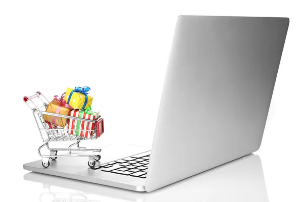 Laptop mit kleinem Warenkorb — Stockfoto