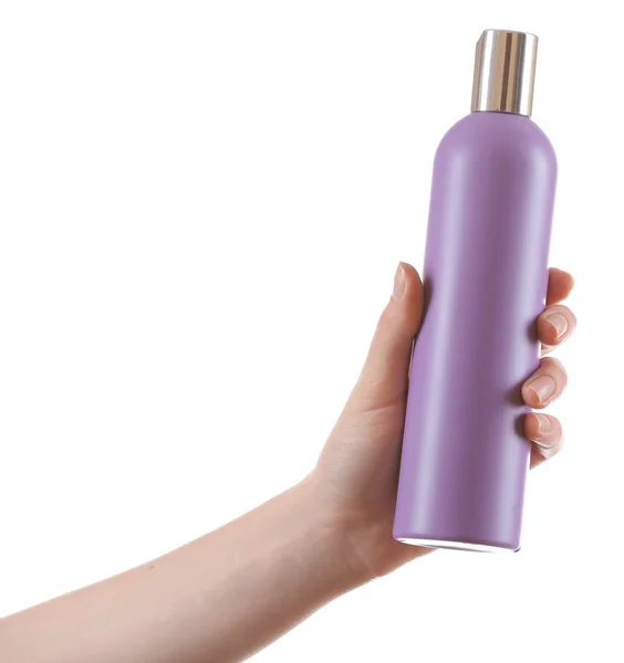 Female hand with cosmetics bottle — Stock Photo, Image