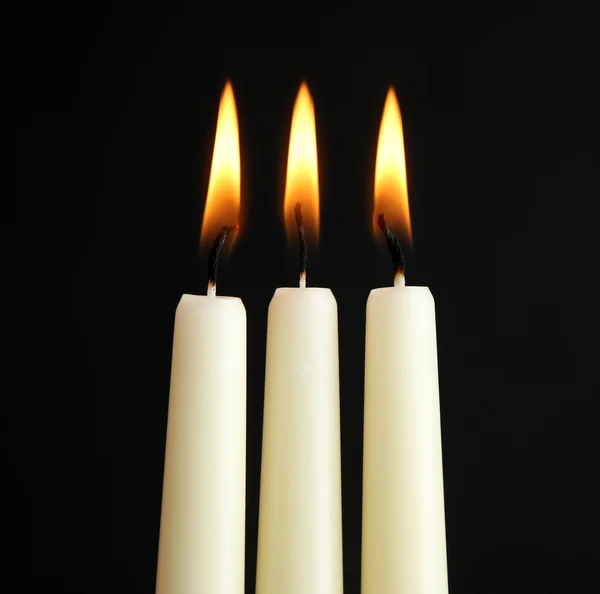 Drie brandende kaarsen — Stockfoto