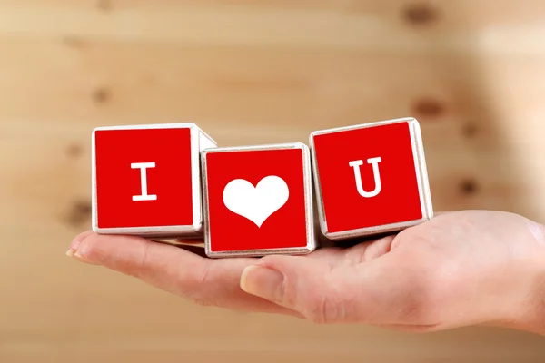 I love you spelled in wooden blocks — Stock Photo, Image