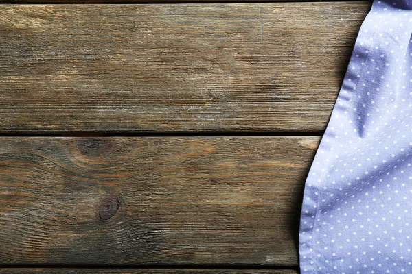 Serwetka na drewnianym stole — Zdjęcie stockowe