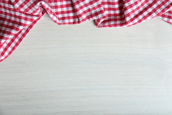 Napkin on wooden table — Stock Photo, Image