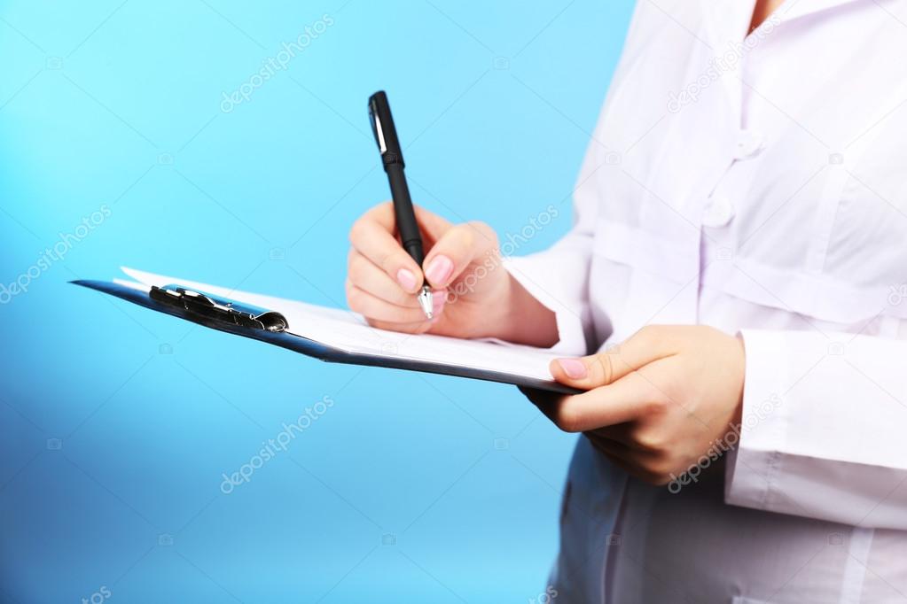 Doctor working with documents