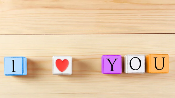 I love you spelled in color wooden blocks — Stock Photo, Image