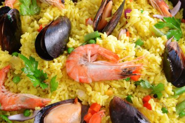 Seafood Paella in pan close-up clipart