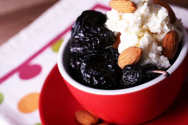 Dessert with prunes and almonds — Stock Photo, Image