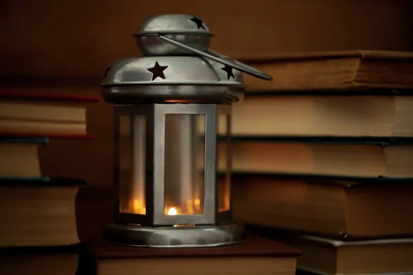 Books and decorative lantern — Stock Photo, Image