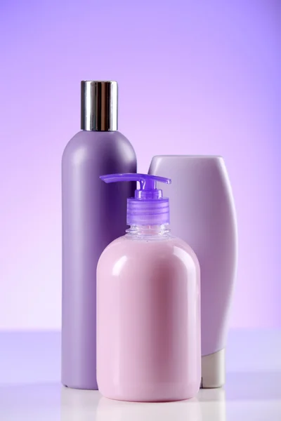 Cosmetic bottles on light background — Stock Photo, Image