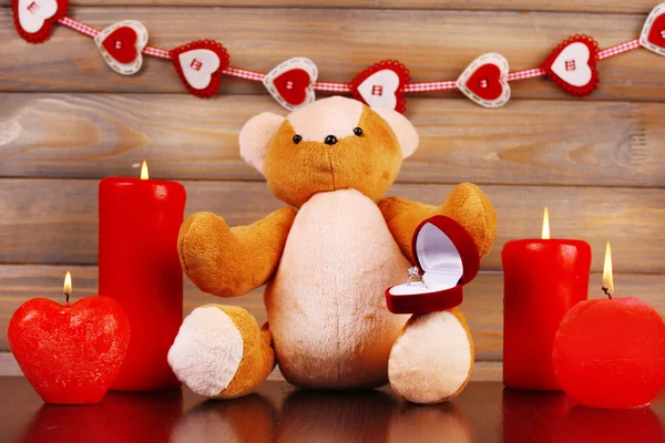 Regalo romántico con velas — Foto de Stock