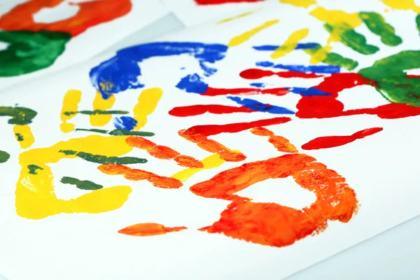 Hand prints of paint — Stock Photo, Image