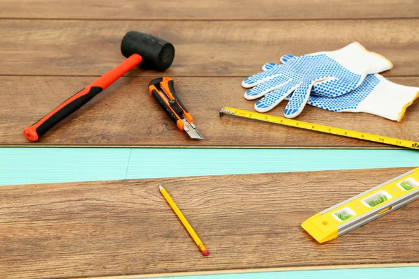 Carpenter tools on floor — Stock Photo, Image