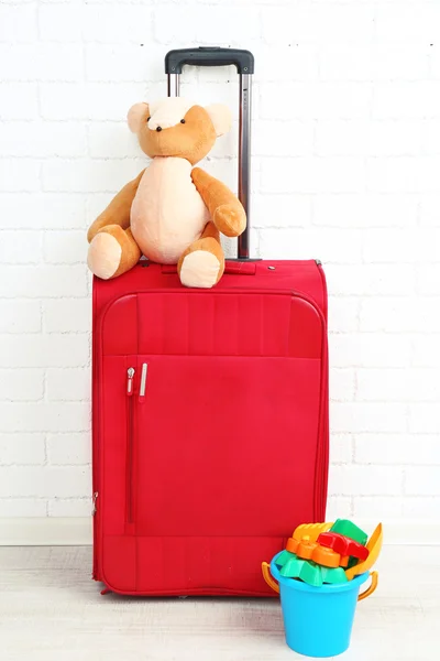 Suitcase with teddy bear — Stock Photo, Image