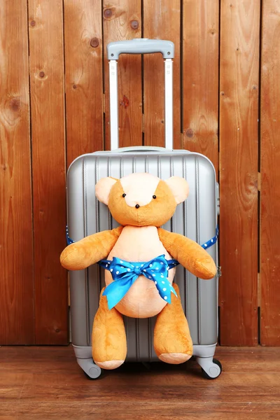 Suitcase with teddy bear — Stock Photo, Image