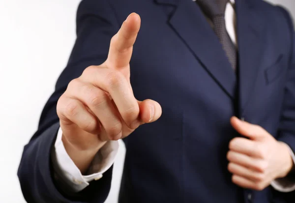 Businessman hand pushing screen — Stock Photo, Image