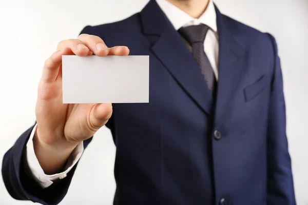 Businessman with business card — Stock Photo, Image