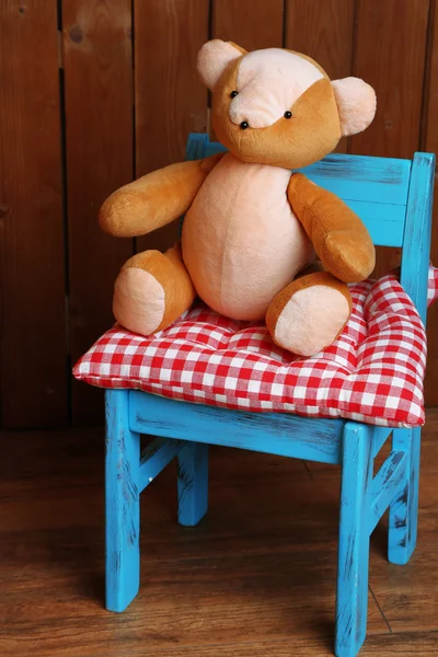 Bear toy on chair — Stock Photo, Image