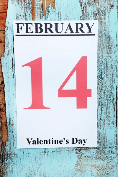 Valentines Day, February 14 on calendar on wooden background — Stock Photo, Image