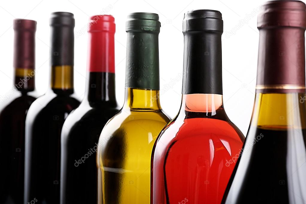 Wine bottles in row