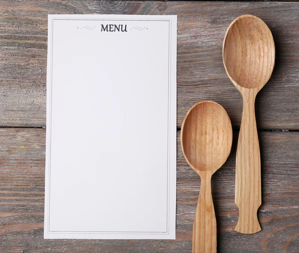 Menu foglio di carta su sfondo rustico superficie in legno — Foto Stock