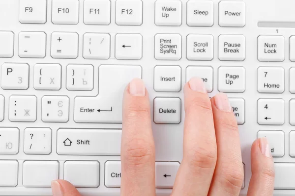 Female hand typing on keyboard, macro view — Stock Photo, Image