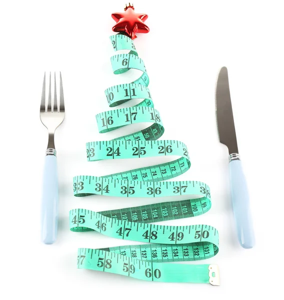 Measuring tape and cutlery with Christmas decoration isolated on white — Stock Photo, Image