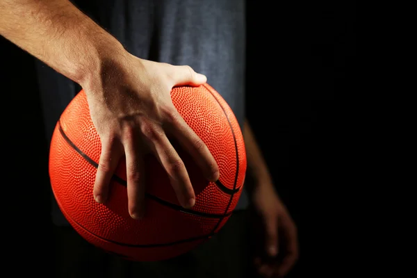 Basketball player holding ball — Stock Photo, Image