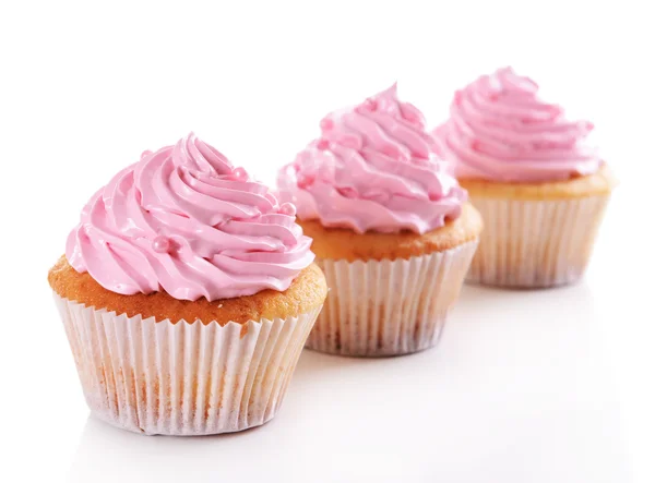 Deliziosi cupcake isolati su bianco — Foto Stock