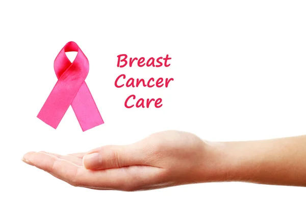 Breast Cancer Care tekst in vrouwelijke hand geïsoleerd op wit — Stockfoto