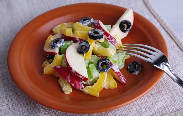 Waldorf salad with olive on plate on table close up — Stock Photo, Image