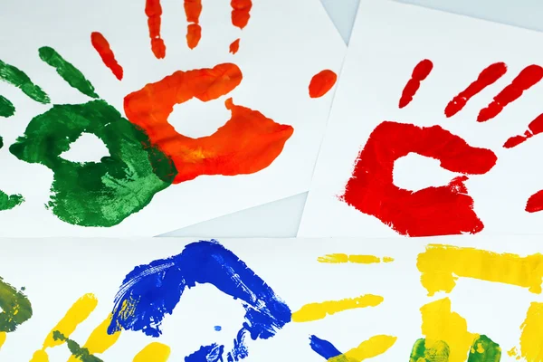 Hand prints of paint on white background — Stock Photo, Image