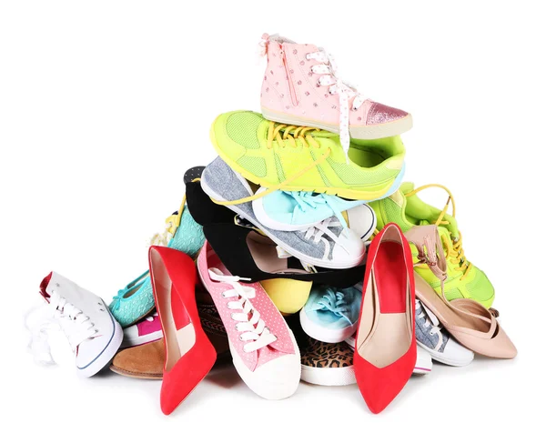 Σωρό από διάφορα γυναικεία παπούτσια που απομονώνονται σε λευκό — Φωτογραφία Αρχείου