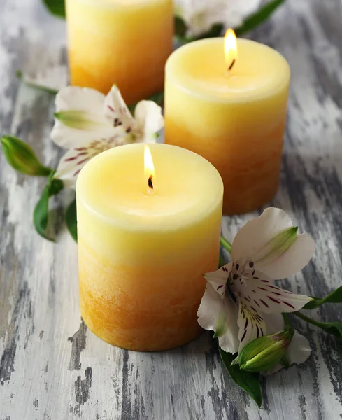 Beautiful candles with flowers — Stock Photo, Image