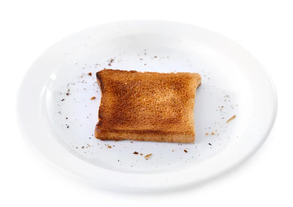 Verbrande toast brood op plaat — Stockfoto