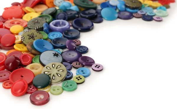 Regenboog van naaien knoppen geïsoleerd op wit — Stockfoto