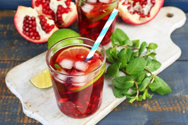 Pomegranate drink in glasses — Stock Photo, Image