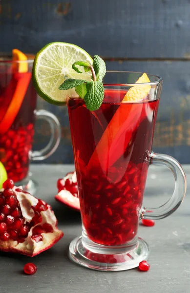 Pomegranate drink in glasses — Stock Photo, Image