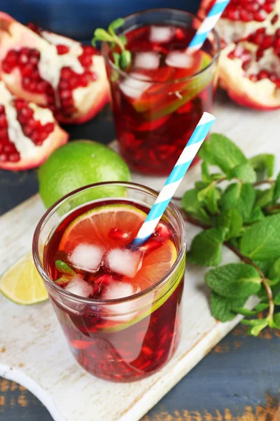 Pomegranate drink in glasses — Stock Photo, Image