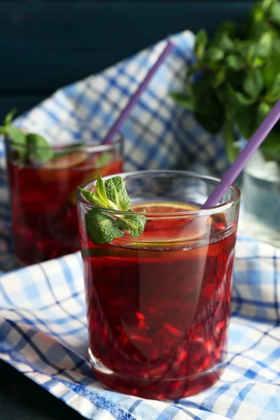 Pomegranate drink in glasses — Stock Photo, Image