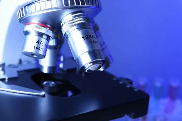 Microscope on color background, close-up — Stock Photo, Image