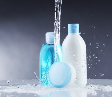 Cosmetic products in water splashes