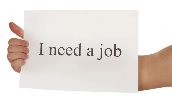 List papíru s nápisem Potřebuji práci v mužské ruce izolované na bílém — Stock fotografie