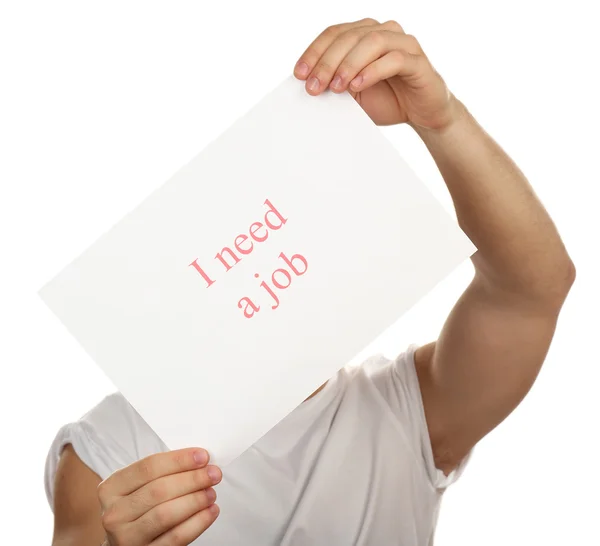 Blatt Papier mit der Aufschrift Ich brauche einen Job in männlichen Händen isoliert auf weiß — Stockfoto