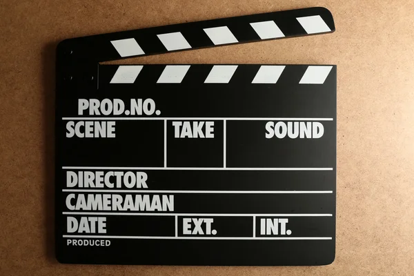 Movie clapper on wooden background — Stock Photo, Image