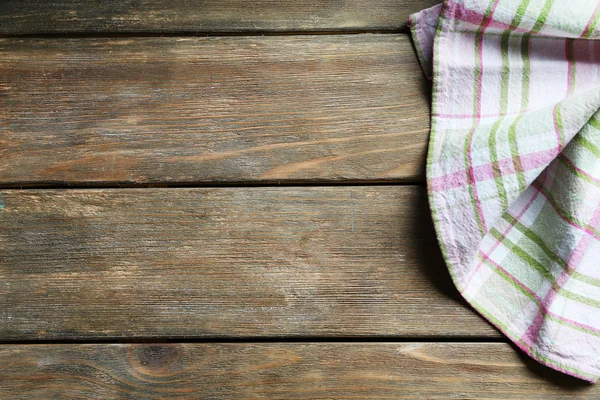 Napkin on wooden table — Stock Photo, Image