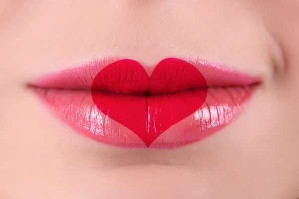 Love concept. Sexy lips with heart shape paint, closeup — Stock Photo, Image