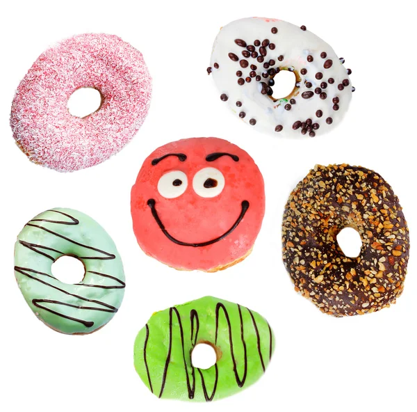 Köstliche Donuts Collage, isoliert auf weiß — Stockfoto